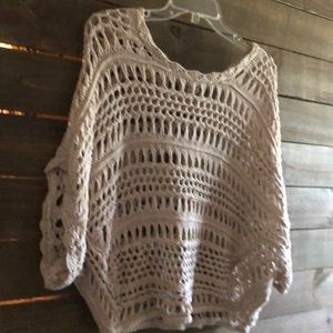 Cream colored crocheted sweater